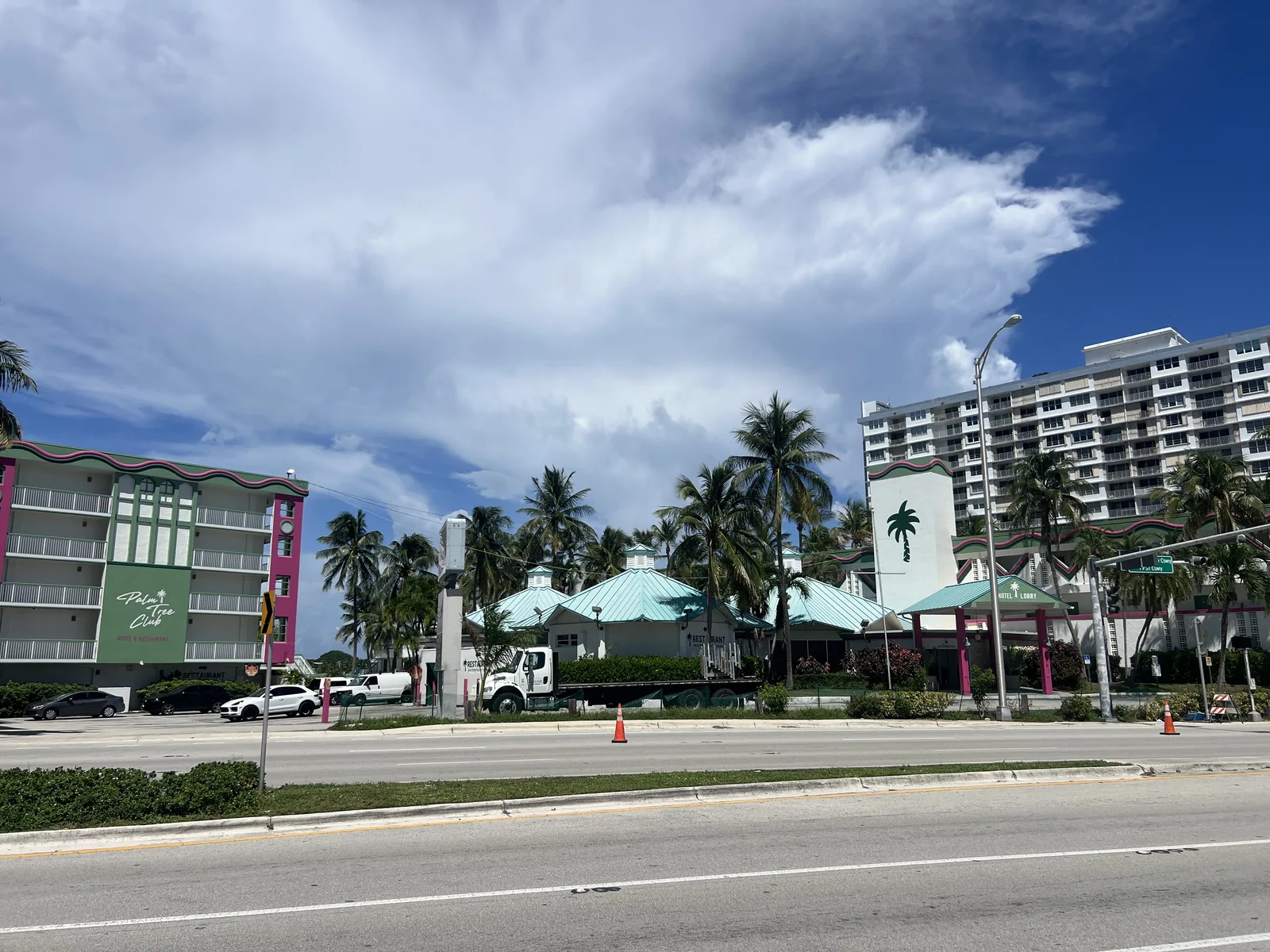 Shops and parking seen across 79th Street Causeway on Treasure Island.