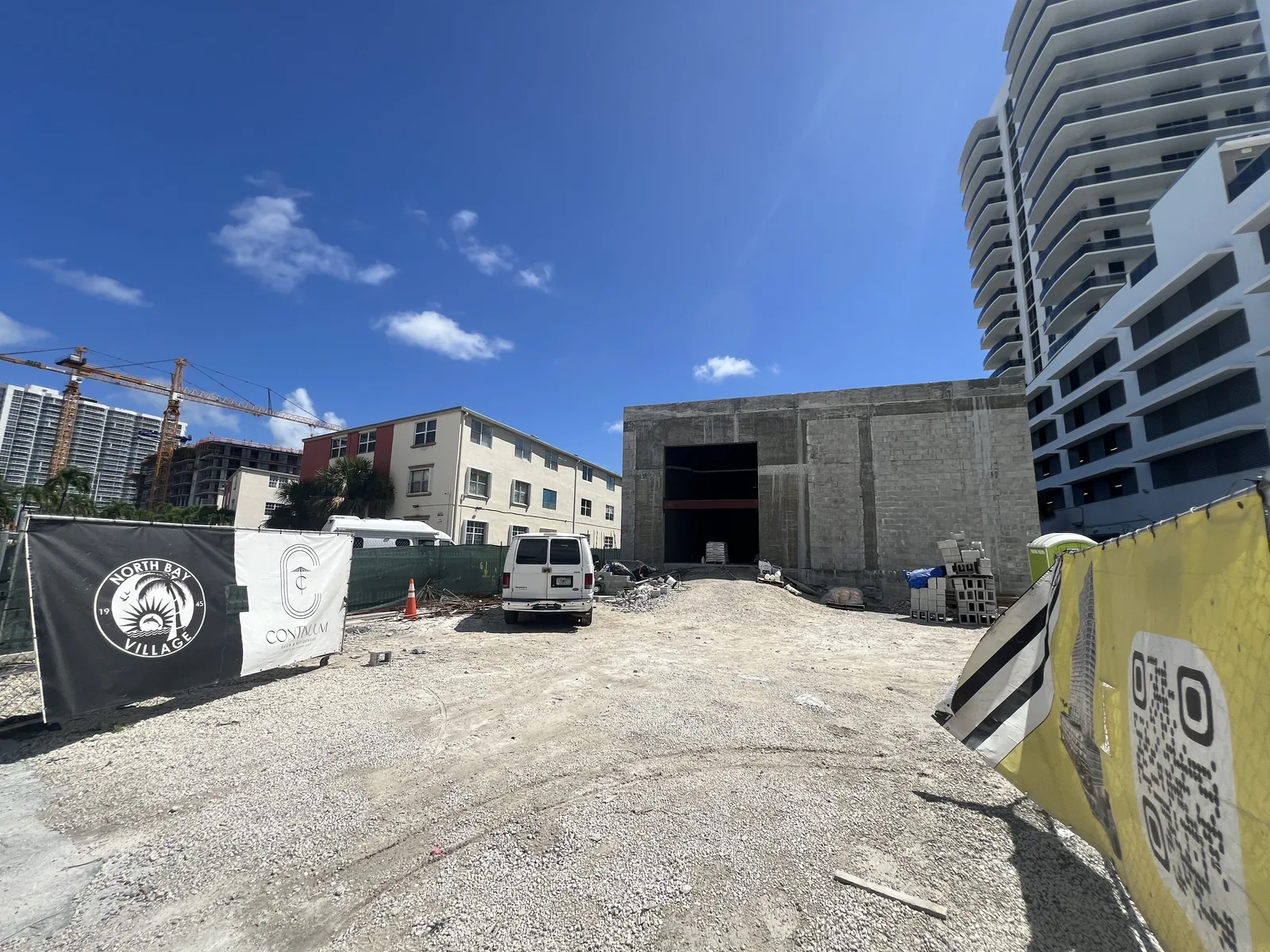 A low concrete structure behind Continuum-branded fencing along 79th Street Causeway.