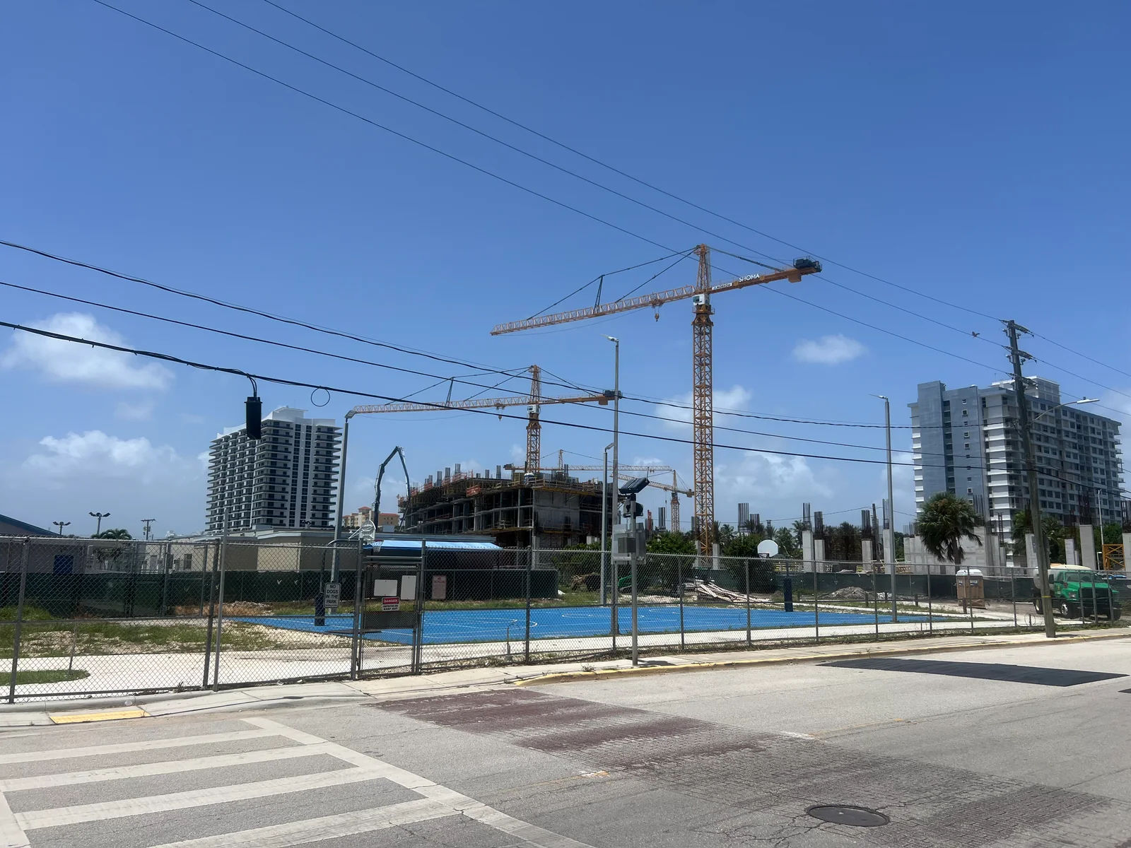 Shoma Bay construction site with tower cranes in North Bay Village